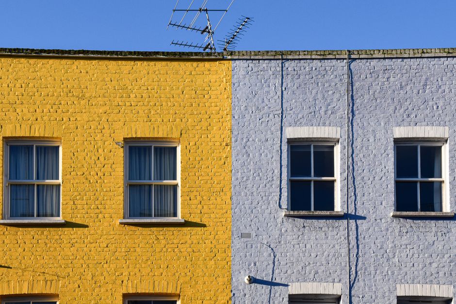 Close-up of a painted wall and window frame on a home