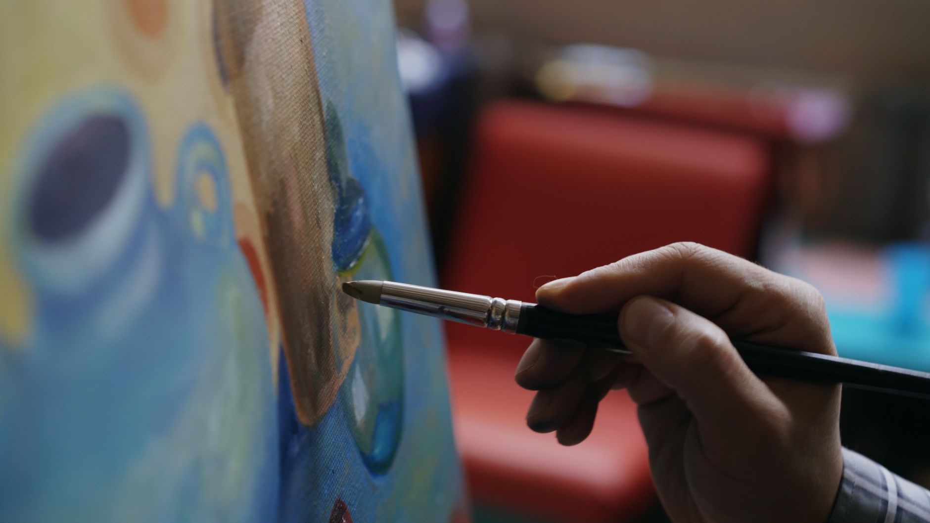 Paintbrushes and colourful paint