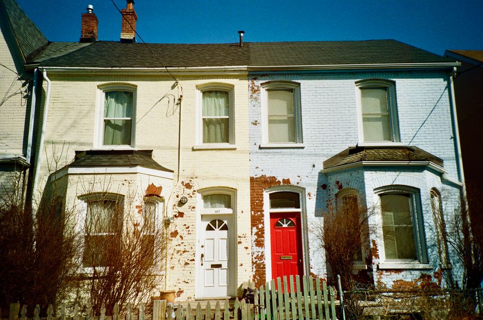 Side of a home with painted walls under daylight